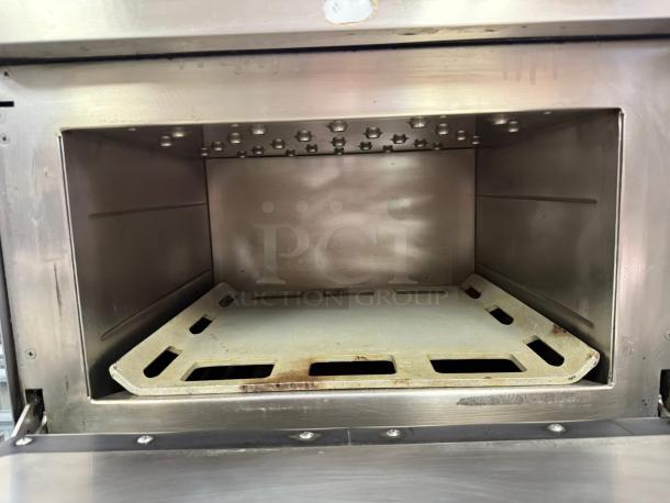 TurboChef NGC Tornado electric countertop rapid cook ventless oven interior, stainless steel, tested, one-touch controls.
