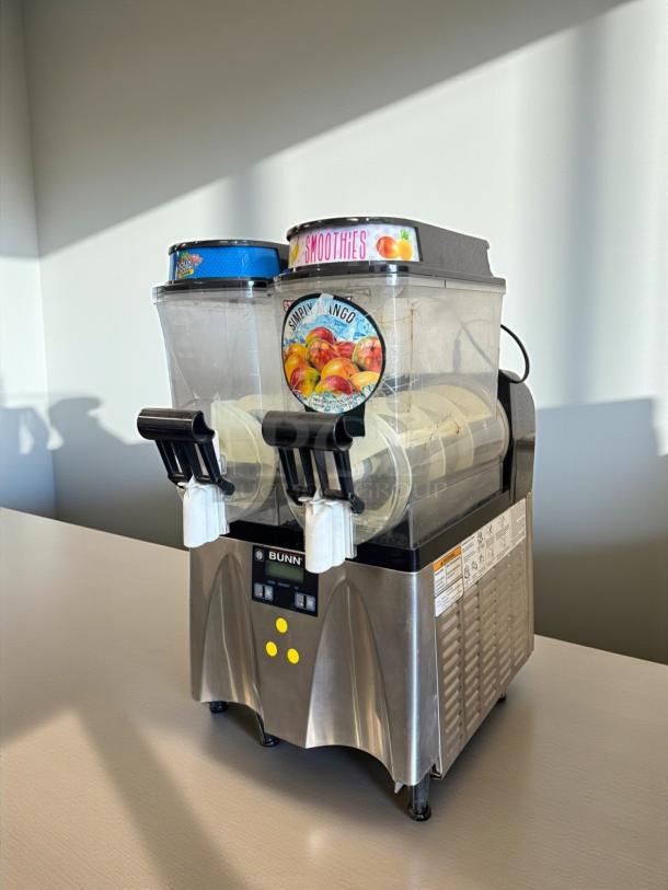 BUNN 34000.0080 ULTRA-2 frozen beverage system, silver, 2 hoppers, tested working, "Simply Mango" label, smoothie cap.