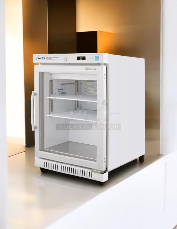 Turbo Air TSU-4RW-N6 vaccine refrigerator. Good condition, countertop model, 115v. Tested and working. Features shelving.