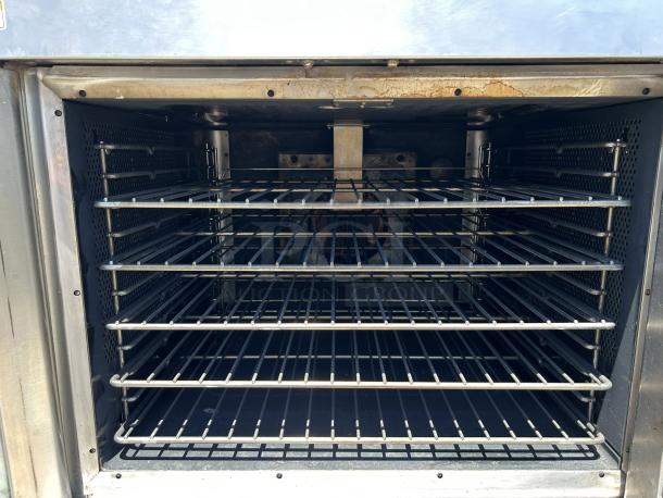 Vulcan VC4GD convection oven, natural gas, 50,000 BTU, six racks, stainless steel, tested, great condition.