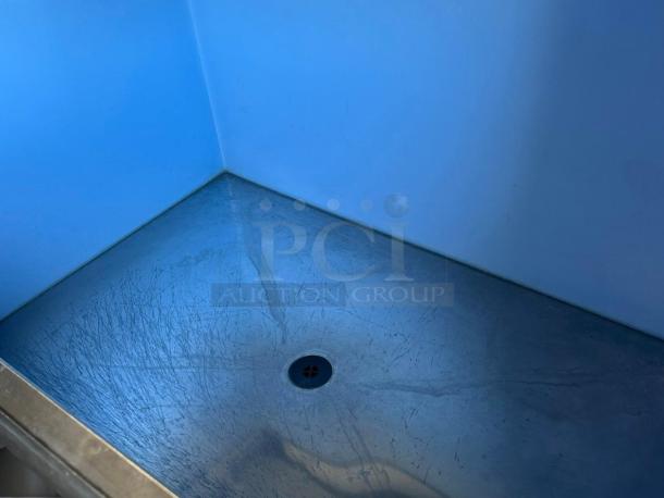 Interior of Hoshizaki IM-500SAA ice machine bin, showcasing excellent condition with minimal surface scratches.