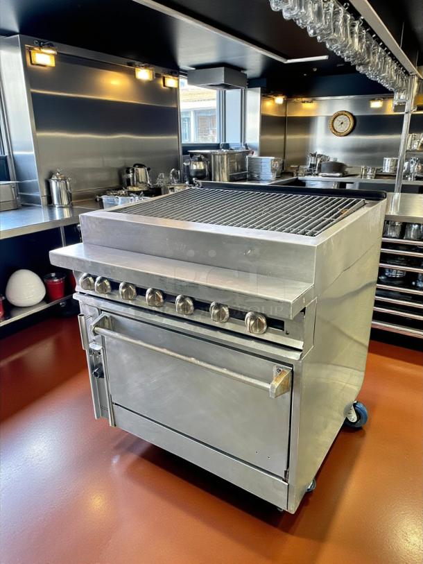 Jade Range JTRH-30B Titan™ gas charbroiler in great condition, stainless steel design, six knobs, on wheels, tested and working.