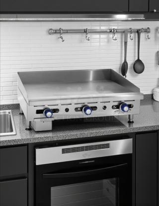 Imperial IMGA-3628 36" commercial gas countertop griddle, tested and working, with manual controls and sturdy construction.