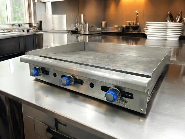 Imperial IMGA-3628 36" commercial gas griddle, tested, working, stainless steel, three blue control knobs, excellent condition.