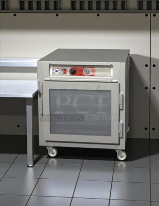 Metro C563L-SFC-L C5 heated holding cabinet, clear doors, under counter, 120V, tested, working condition, on wheels.