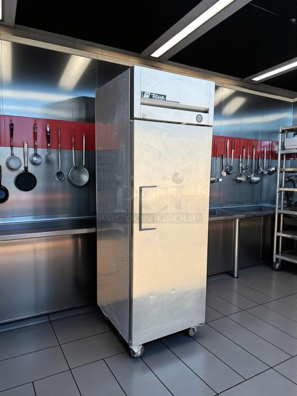 True TM-24 top mount commercial cooler, 24 Cu.Ft, stainless steel, swing door, great condition, tested and working.
