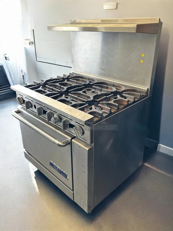 Imperial Range IR-6NG Pro Series 36" with 6 burners, standard oven, tested and working condition, stainless steel finish.