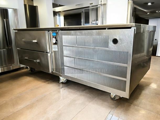 Randell Model 20048SC 60" refrigerated chef base, 2 drawers, good condition, 120V, tested and working with visible gauge.