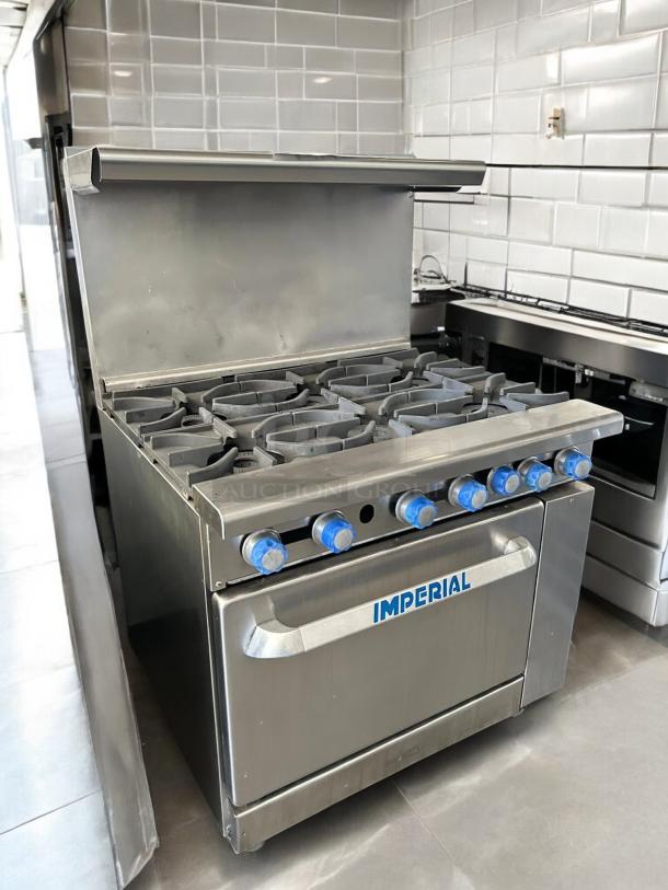 Imperial IR-6 range, 6 burners, 1 oven, 36", natural gas. Tested, working, stainless steel, with blue control knobs.