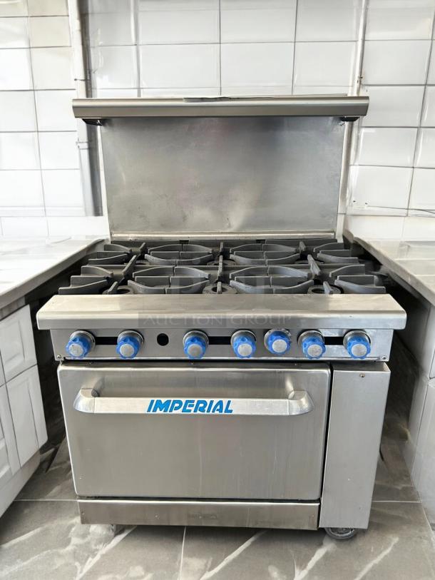 Imperial IR-6 Restaurant Range, 6 burners, 1 oven, 36", natural gas, tested & working, stainless steel, Imperial branding visible.