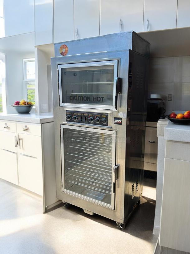 NuVu Model SUB-123P double deck electric oven proofer combo, stainless steel, "Caution Hot" label, excellent condition.