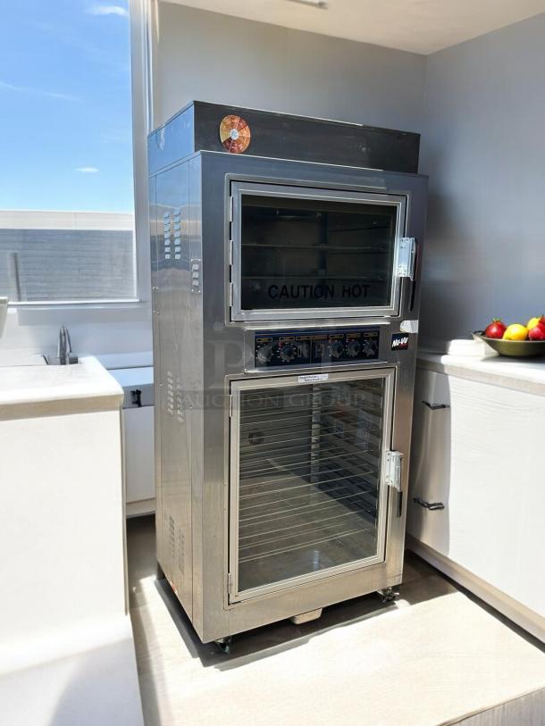 NuVu SUB-123P Double Deck Electric Oven Proofer Combo, stainless steel, tested and working, with "Caution Hot" label.