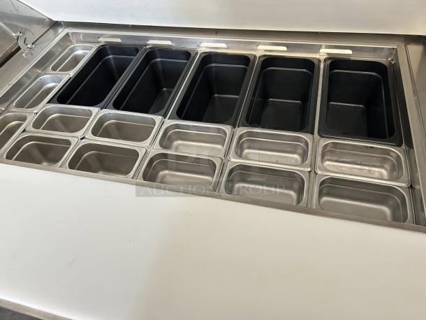 Everest Refrigeration EPBR2 mega-top sandwich prep table, 47.5-inch, two-section with multiple compartments, great condition.