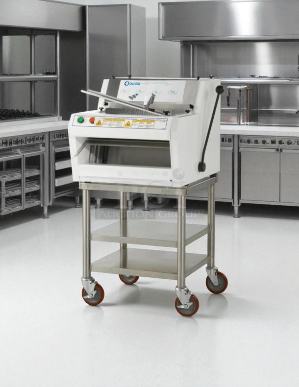 Oliver 732-N front-load bread slicer, great condition, with bagging scoop, 115v, tested and working in stainless steel kitchen.