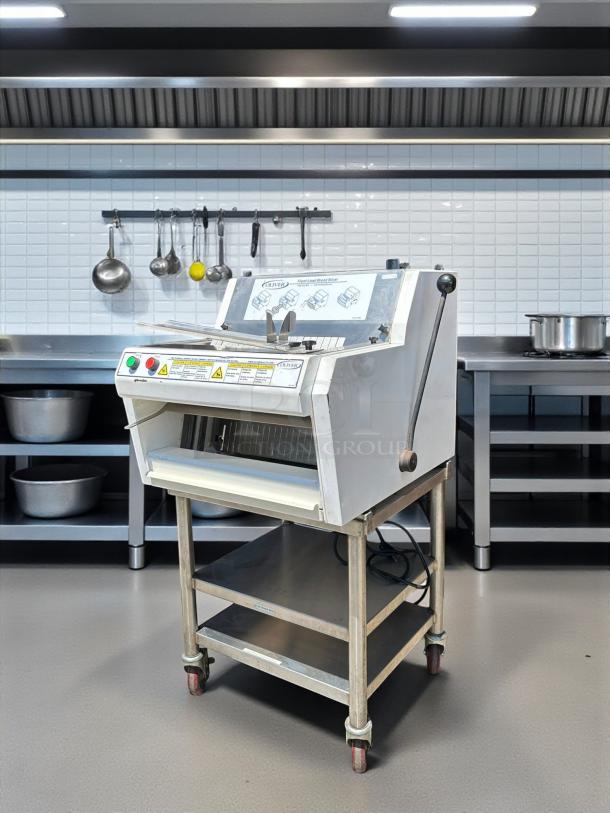 Oliver 732-N front-load bread slicer with bagging scoop, in great condition, on stand. 115v, tested and working.