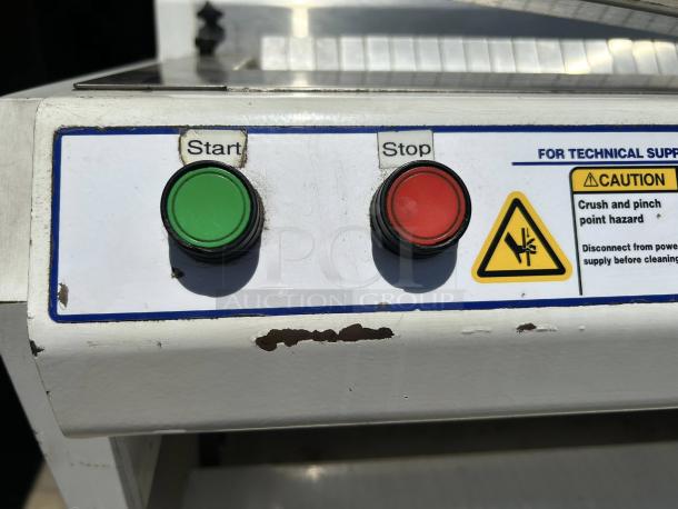Oliver 732-N bread slicer control panel with start and stop buttons, caution label visible. Slight wear on edges.