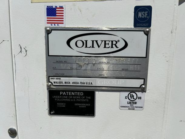 Oliver 732-N Bread Slicer label, NSF approved, UL listed, made in USA; features model, serial number, and patent info.