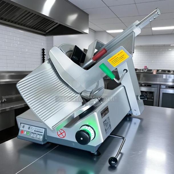 Bizerba Model L-22 meat slicer, 13" blade, safety illuminated dial, 1/2 hp, aluminum, tested and working.