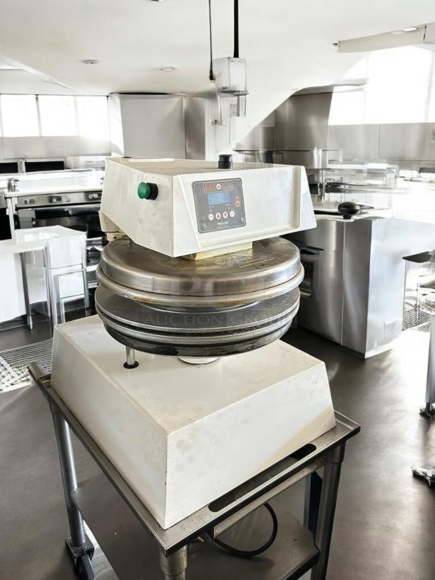 Proluxe DP2350S 17" Automatic Pizza Dough Press, 208V 1PH, tested and working. Used condition with visible controls.