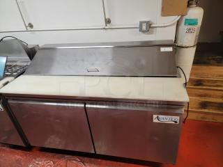 Avantco 60" stainless steel two-door sandwich prep table, model 178SSPT60HC, in excellent condition with cutting board surface.