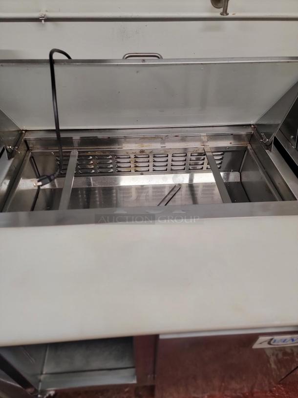 Avantco 36" sandwich prep refrigerator, model 178SSPT36HC, in excellent condition, stainless steel interior and exterior.