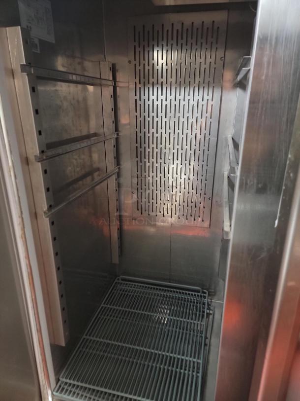 Avantco 2-Door Commercial Reach-In Refrigerator, Model 178CFD2RR, interior view showing shelving and cooling vents.
