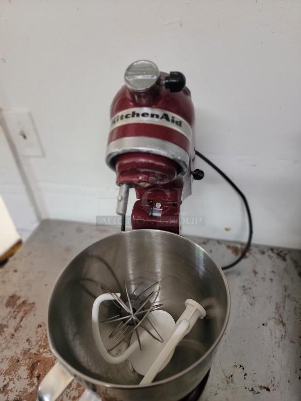KitchenAid Artisan Series 5-Quart Stand Mixer with attachments, 325-watt motor, classic red, gently used condition.