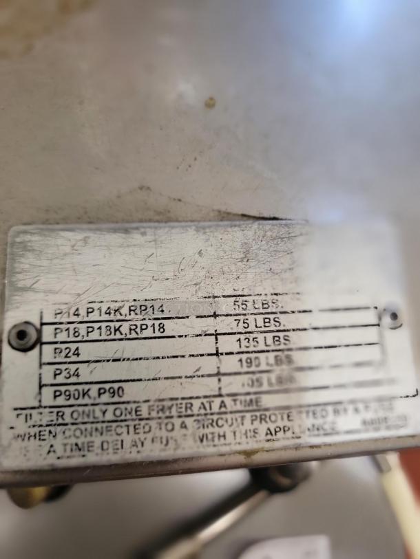 Southbend Mobile Fryer Oil Filter System tag showing fryer model capacities; essential for oil maintenance in commercial kitchens.