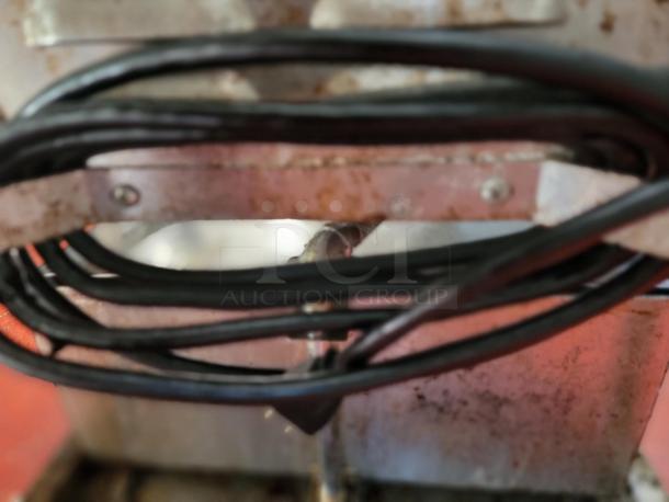 Southbend mobile fryer oil filter system, visible wiring, used condition, includes spare filters, ideal for restaurants.