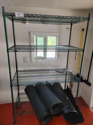 Green Metro commercial wire shelving unit with included meat saws and rubber mats. Ideal for kitchens or storage areas.