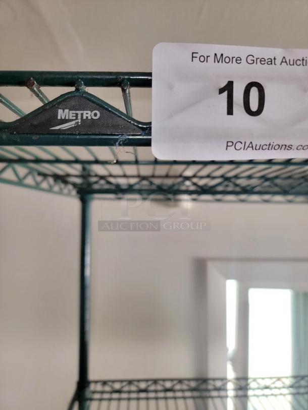 Green Metro commercial wire shelving unit with bonus meat saws/cleavers. Includes rubber floor mats. Ideal for storage.
