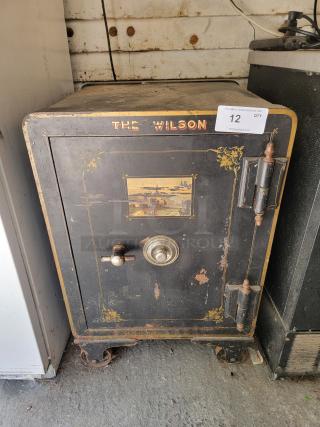 Antique Vulcan "The Wilson" safe, ornate design, vintage patina, robust construction. Combination included, ideal decorative piece.