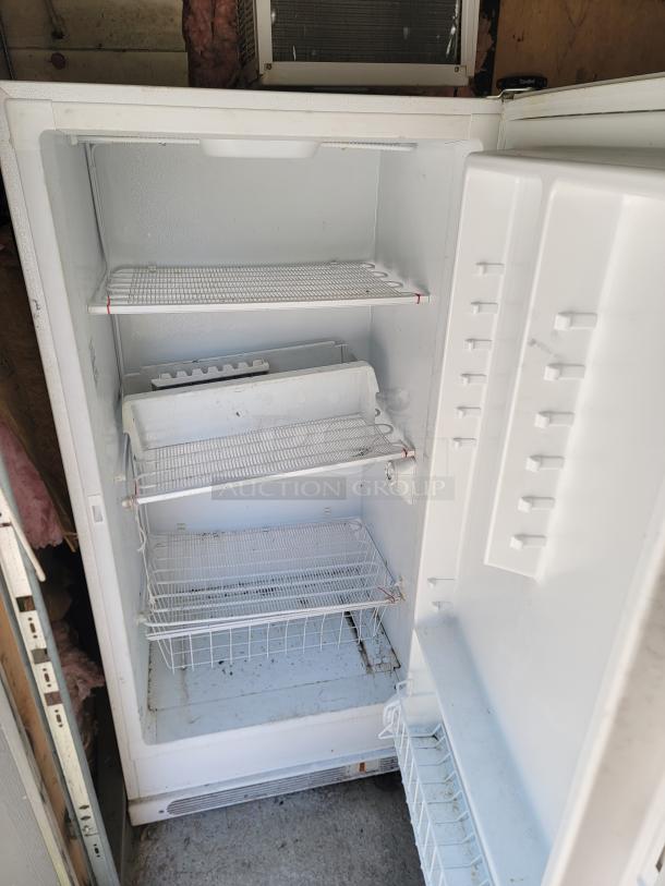 Frigidaire FFU17M7HWF upright freezer, 17.0 cu. ft., wire shelves, good condition, for home/business, buyer must remove.