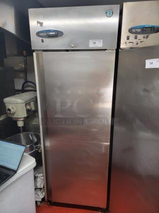 Hoshizaki CF1S-SF single door upright freezer, stainless steel, commercial-grade, minor wear, visible auction tag #15.