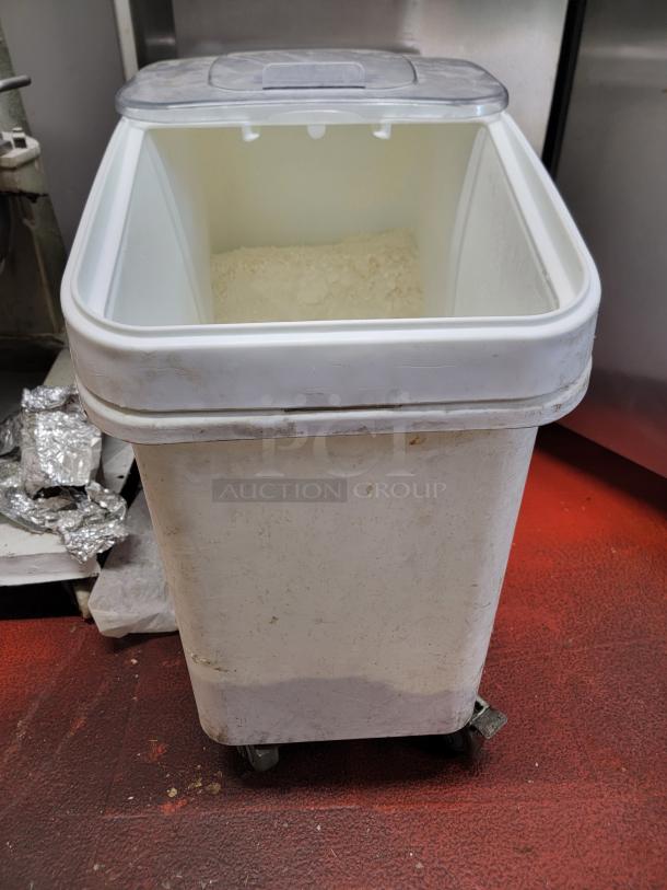 Baker's Mark 20 Gallon Ingredients Bin with clear lid, used condition; mobile with caster wheels, ideal for commercial kitchens.