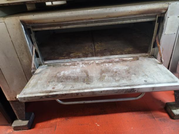 Blodgett DFG commercial convection oven with open door; used with visible wear, ideal for professional kitchens.