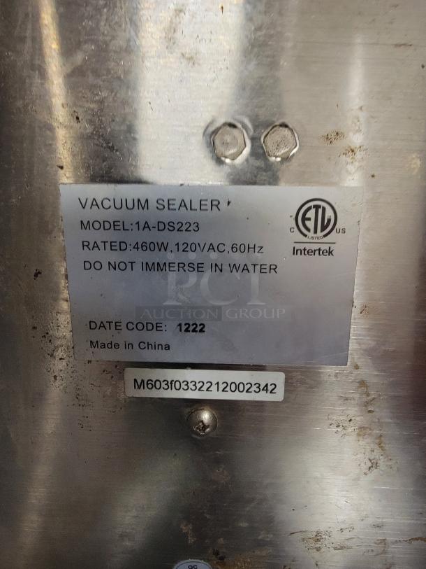 Walton's 12" commercial vacuum sealer, model 1A-DS223, pre-owned, rated 460W, 120VAC, 60Hz, not to immerse in water, made in China.