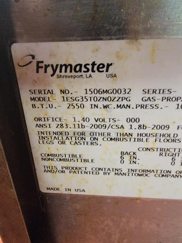 Frymaster label showing model 1ESG35T0ZN0ZZPG, serial 1506MG0032, BTU 2550. Energy-efficient commercial gas fryer. Made in USA.