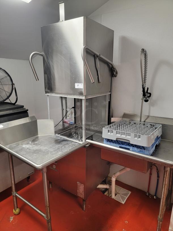 Champion DH6000T commercial hood-type dishwasher with stainless steel tables and pre-rinse faucet, in good condition.