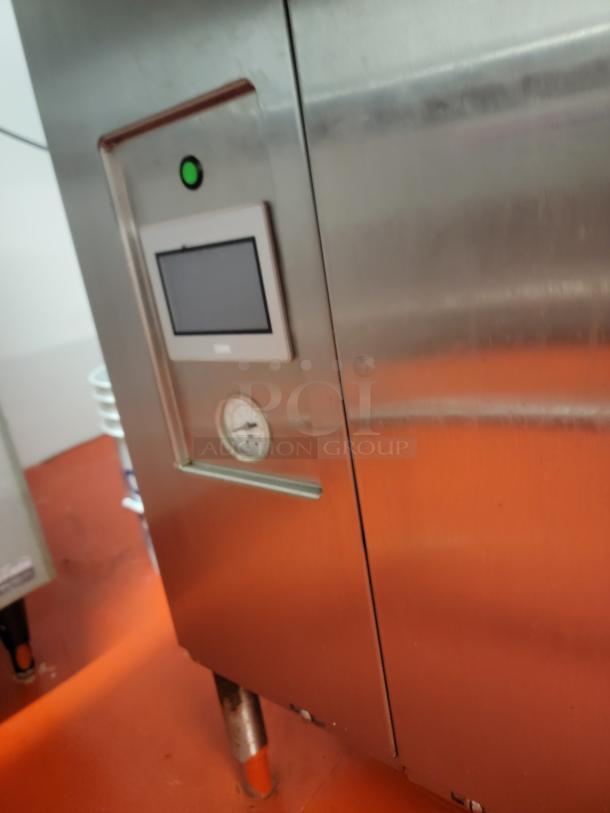 Champion DH6000T commercial hood dishwasher, stainless steel, with display panel and gauge, includes dish tables and pre-rinse faucet.
