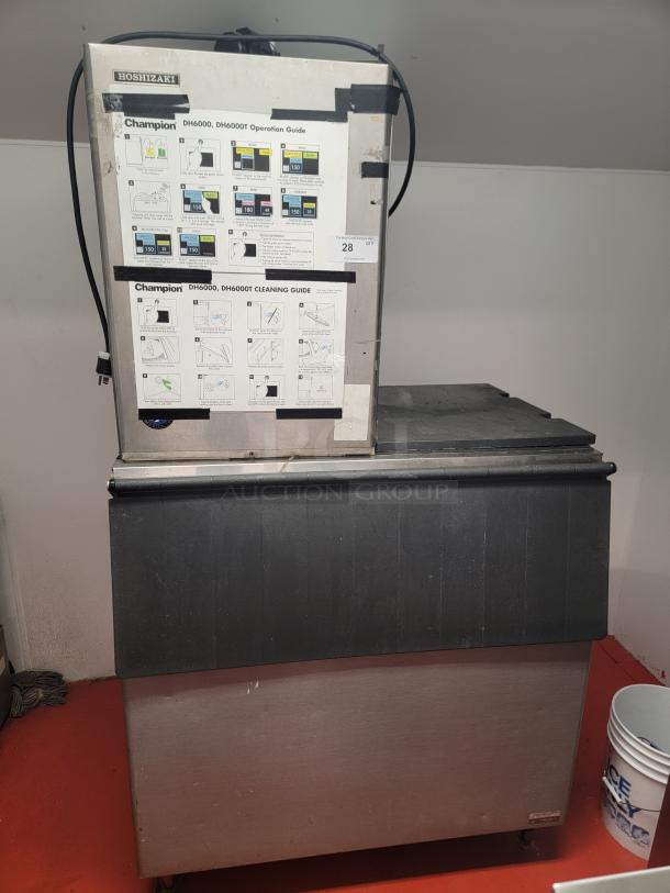 Hoshizaki KM501MAH commercial ice maker with storage bin, featuring a robust design for efficient ice production.