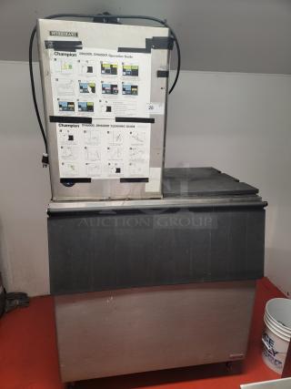 Hoshizaki KM501MAH commercial ice maker with storage bin, featuring a robust design for efficient ice production.