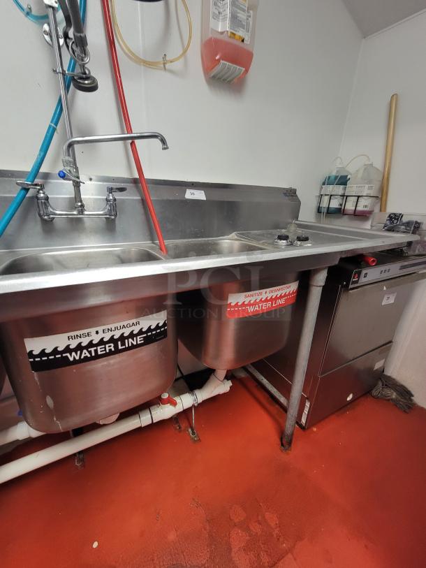 Eagle Group 3-compartment stainless steel sink with pre-rinse faucet, NSF-certified, for commercial kitchens.