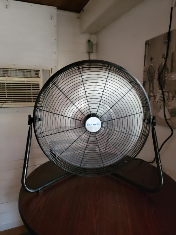 Lot of 8 assorted industrial fans, featuring a "BILT HARD" label, ideal for commercial use, in good condition.