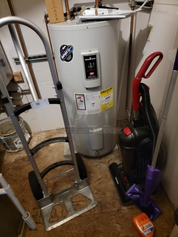 Commercial bundle with U-line keg hand truck and Sanitaire Quiet Clean vacuum. Durable tools for material handling and cleaning.