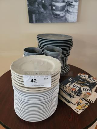 Commercial-grade dinnerware set with stacked plates, bowls, and Miller Lite coasters. Includes auction label with lot number.