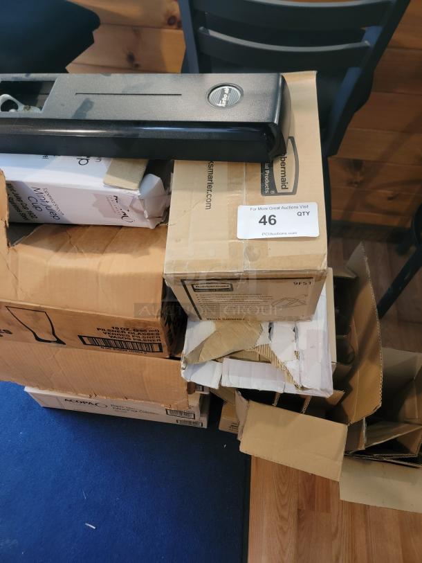 Massive glassware lot with various boxes on the floor, ideal for bars or events. Commercial-grade, sparkling clean, buyer must remove.