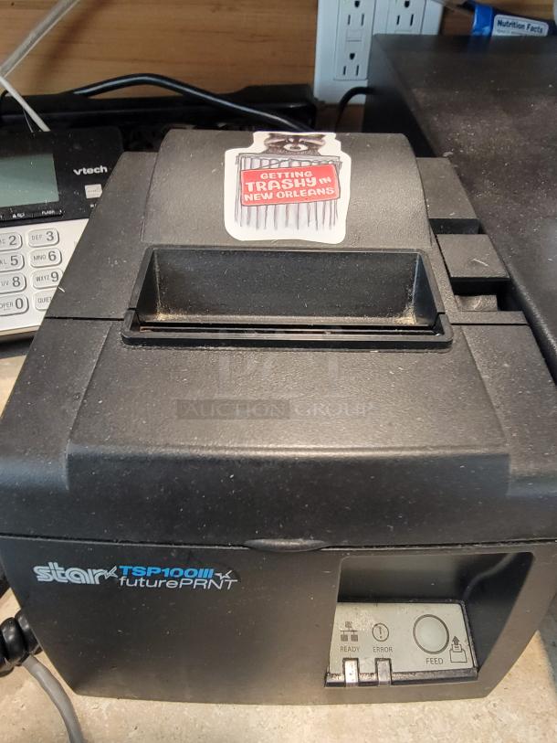 Star TSP100 futurePRNT printer, part of TouchBistro POS System. Slight wear visible. Sticker reads "Getting Trashy in New Orleans."