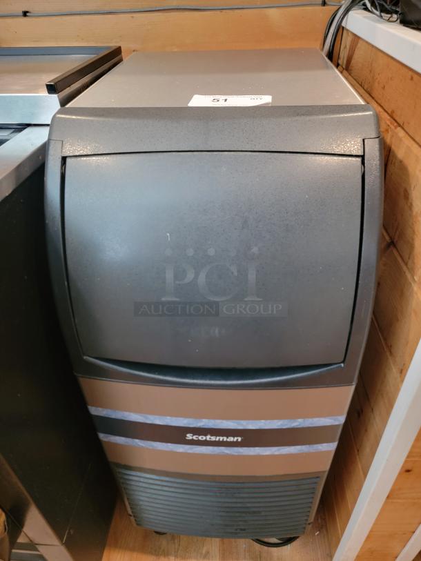 Scotsman CU0715MA-1A undercounter ice machine, black finish, 80lb/day capacity, ideal for restaurants and home bars.
