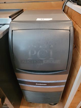 Scotsman CU0715MA-1A undercounter ice machine, black finish, 80lb/day capacity, ideal for restaurants and home bars.